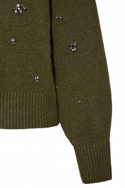 Knitted cardigan with decorative embellishments