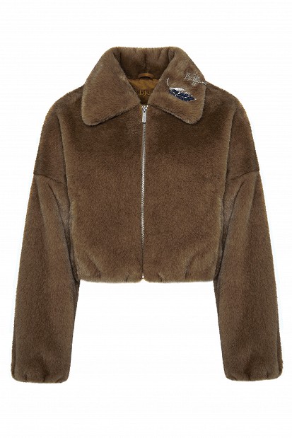Cropped bomber jacket with decorative pins on the collar