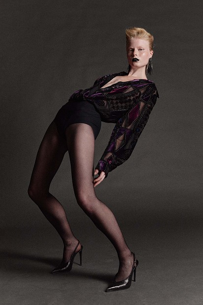 Sheer bodysuit with geometric patterns and velvet details