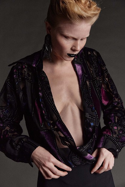 Sheer bodysuit with geometric patterns and velvet details