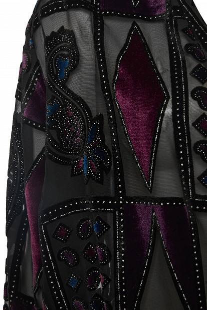 Sheer bodysuit with geometric patterns and velvet details