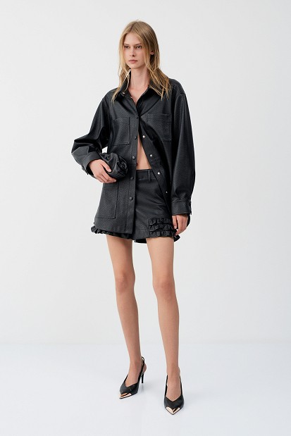 Leather-effect shorts with ruffle detailing