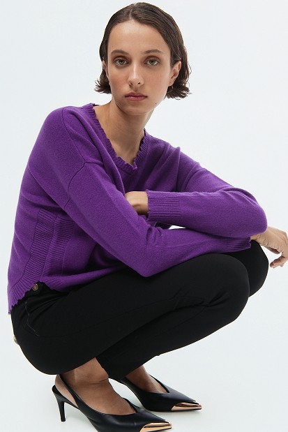 Wool sweater with distressed details