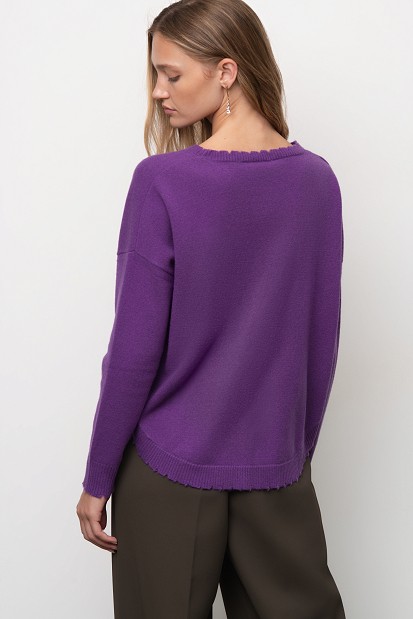 Wool sweater with distressed details
