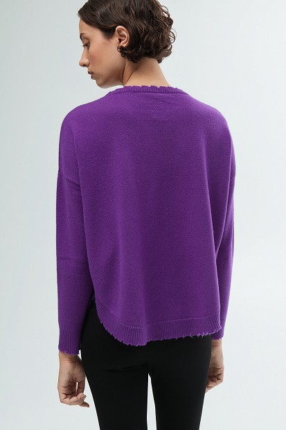 Wool sweater with distressed details