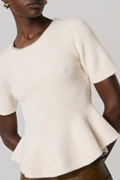 Pulover stil peplum cu decolteu cu pietricele