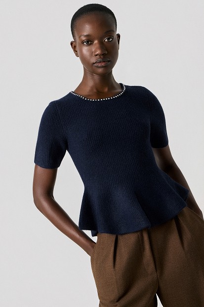 Pulover stil peplum cu decolteu cu pietricele