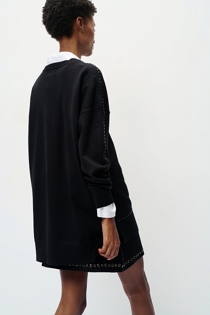 Sweater with decorative studs