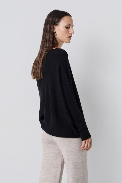 Asymmetric knitted sweater