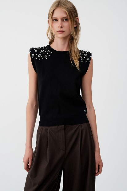 Sleeveless sweater with rhinestone embellishments