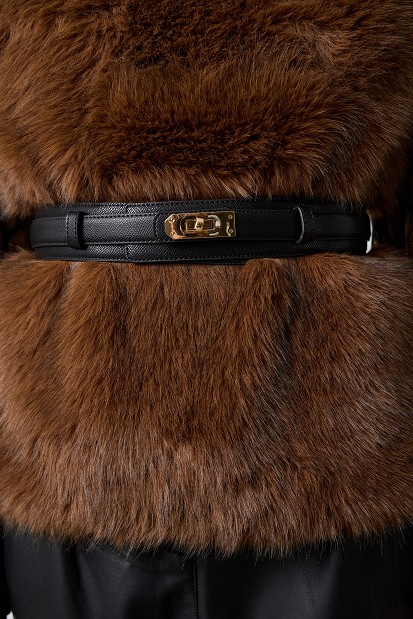 Leather belt with a metal buckle