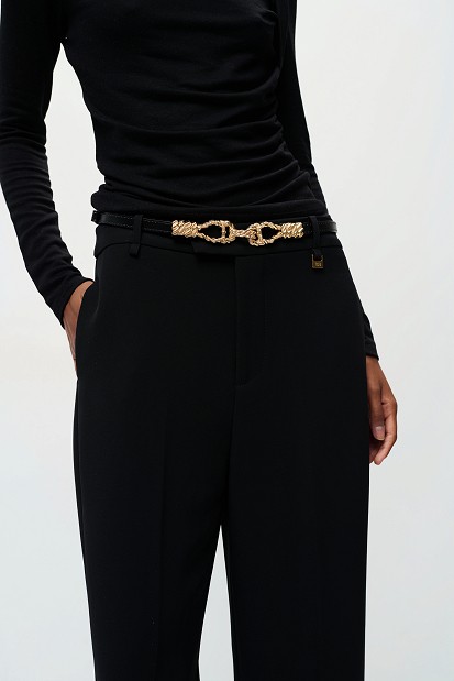 Belt with a metal buckle