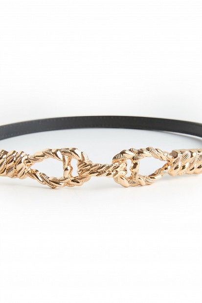 Belt with a metal buckle