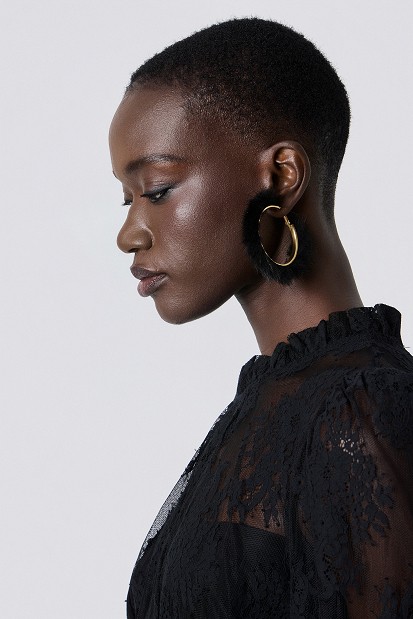 Gold hoop earrings with faux fur