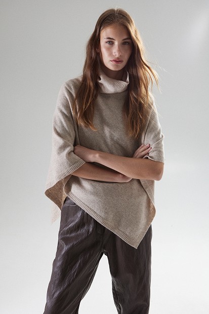 Wool cape with an asymmetric hem