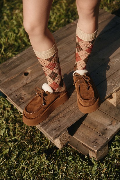 Knee-high socks with an argyle pattern