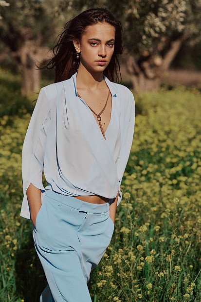 Blusa cruzada manga larga cadena