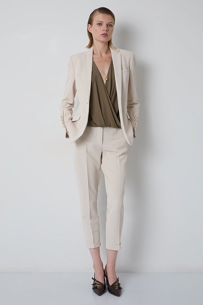 Sleeveless wrap blouse with a necklace detail