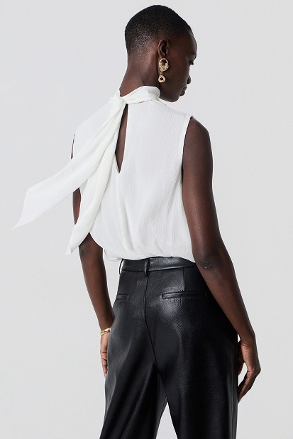 Sleeveless wrap top