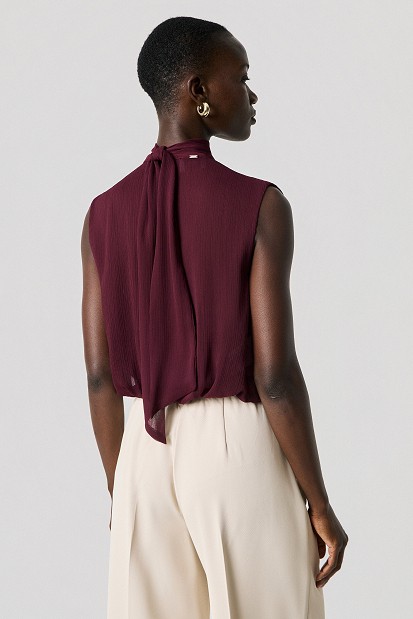 Sleeveless wrap top