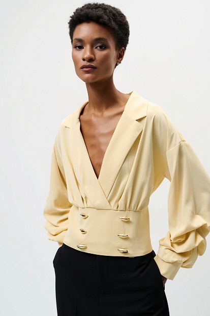 Cropped blouse with decorative buttons