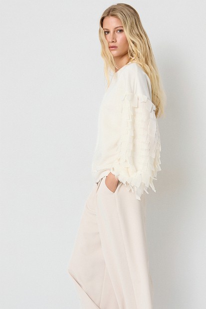 Sweatshirt with fringe detailing on the sleeves