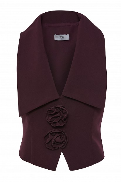 Sleeveless blouse with lapels and floral details