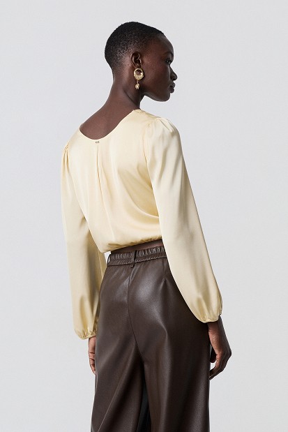Satin-look top with a front knot