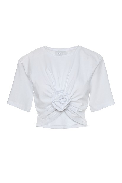 Cropped top with shoulder pads and appliqué flower