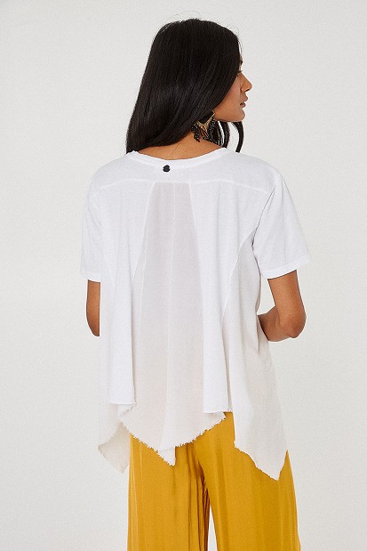 Blouse with asymmetric hemline and fringes