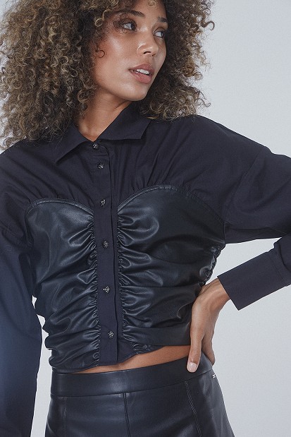 Shirt with leather look detail