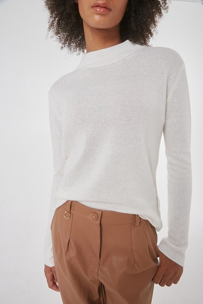 Knit sweater with high neckline