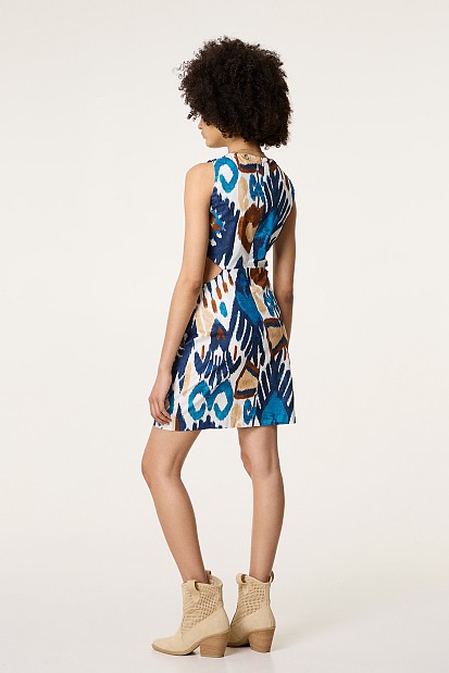 Printed dress with cut outs