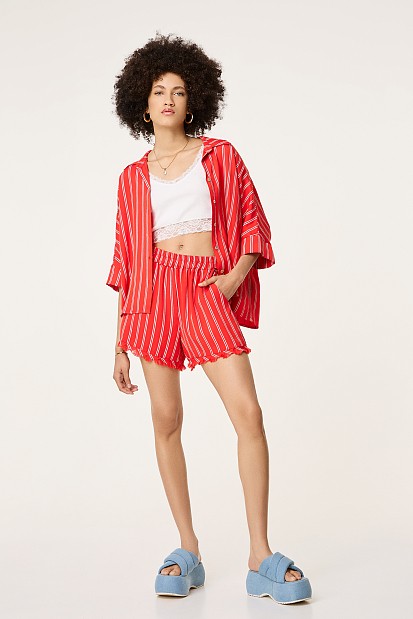 Striped shorts with fringes