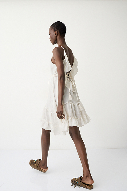 Mini dress with ruffles and open back