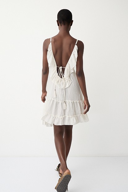 Mini dress with ruffles and open back
