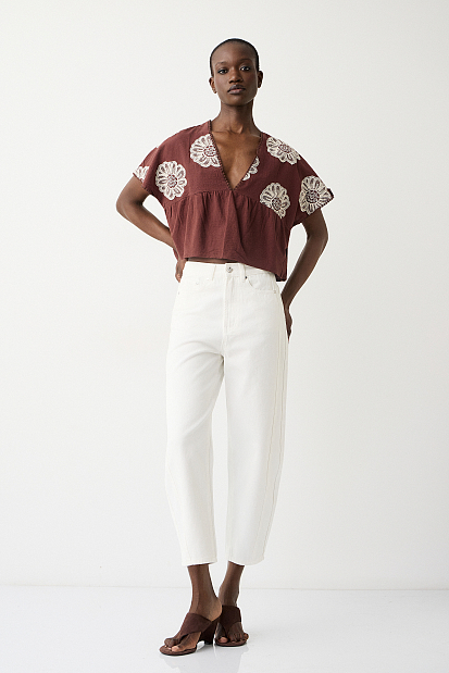 V top with embroidered details