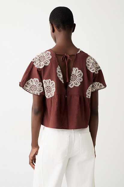 V top with embroidered details