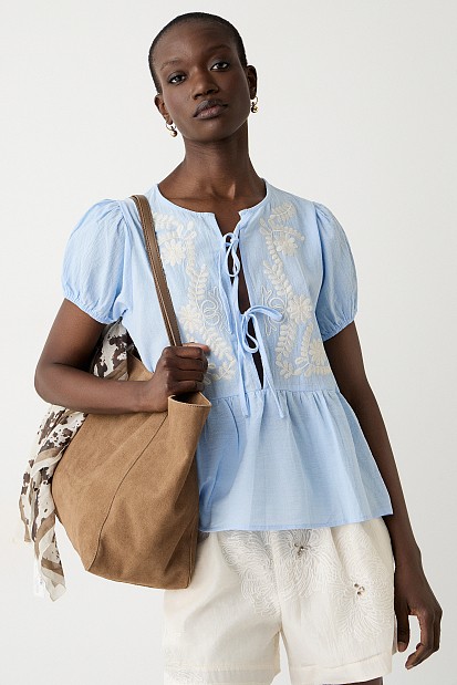 Embroidered blouse with short sleeves and self tie