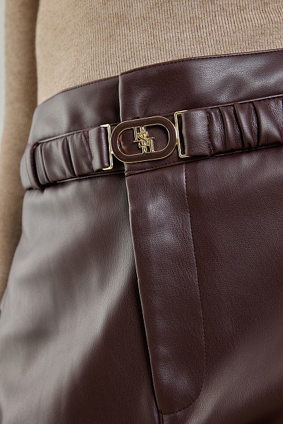 Leather look trousers with belt
