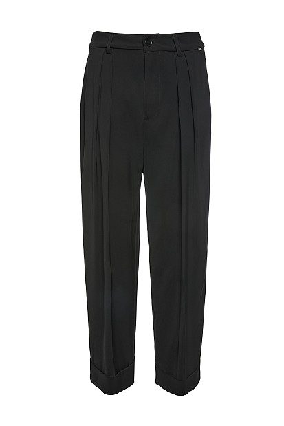 Trousers with turn-up hem