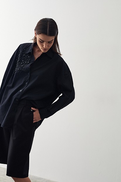 Shirt with applique rhinestones
