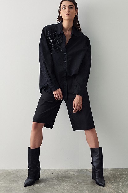 Shirt with applique rhinestones