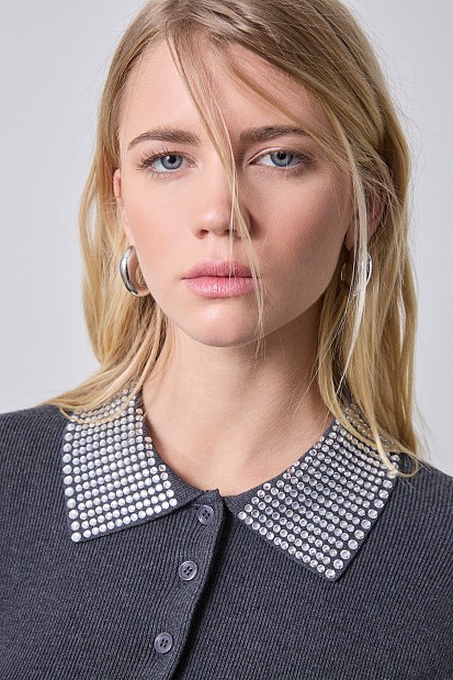 Sweater with rhinestones on the collar
