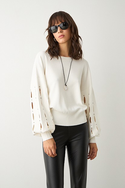 Sweater with cut outs on the sleeves