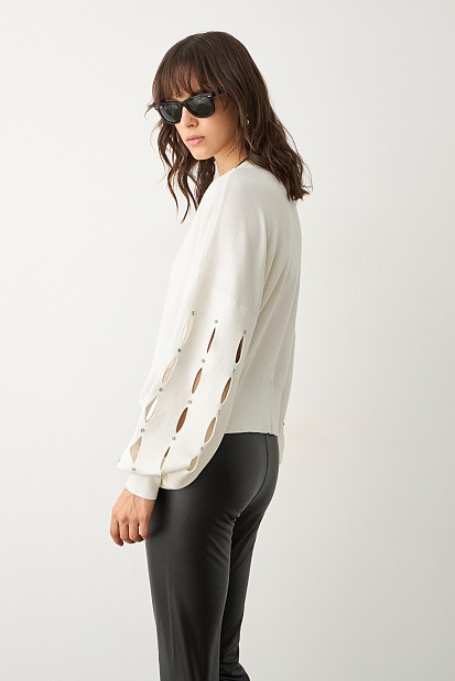 Sweater with cut outs on the sleeves