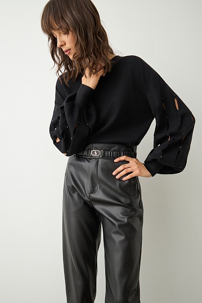 Sweater with cut outs on the sleeves