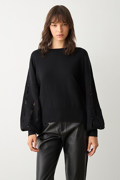 Sweater with cut outs on the sleeves