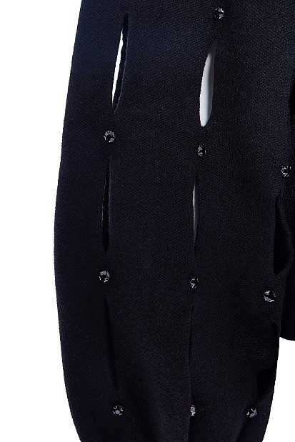 Sweater with cut outs on the sleeves