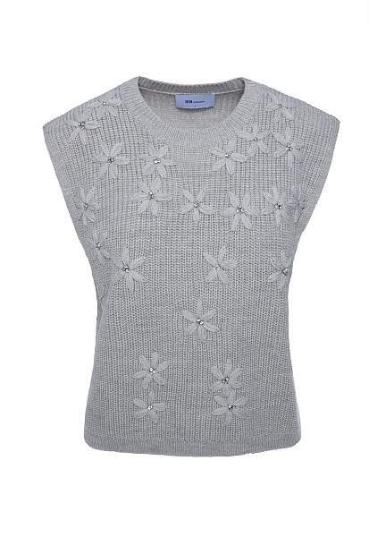 Sleeveless sweater with knitted flowers